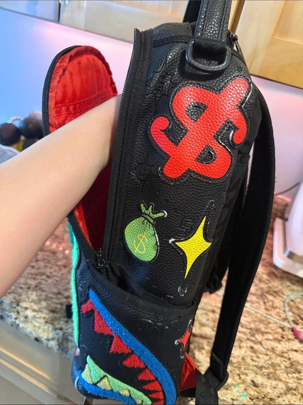 Sprayground Black Backpack with Neon Green Bear Patch and Multicolor Accents